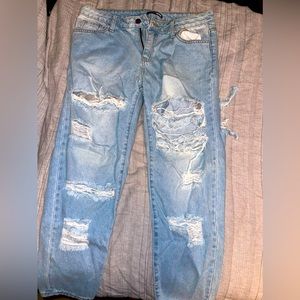 Super distressed Fashion Nova cropped jeans